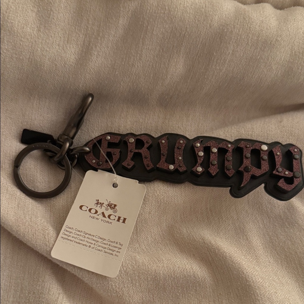 Coach Grumpy Keychain